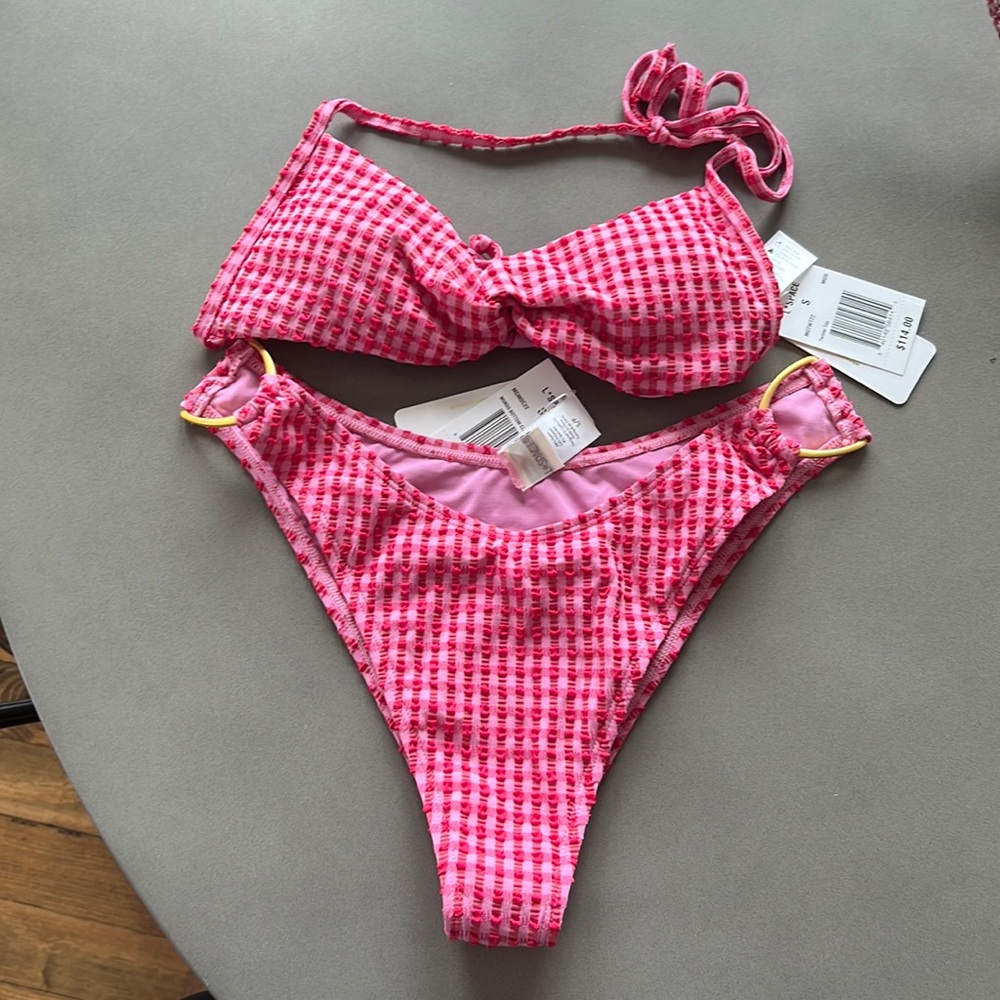 LSPACE BIKINI NWT. Never worn. Sold together as set. Size small top & bottom.